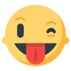 突き出た舌とまばたきの目をした顔
