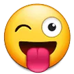 突き出た舌とまばたきの目をした顔